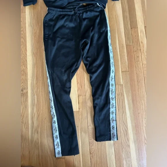 New in the bag black sweatshirt and sweatpants sealed in package.  Sz S, Med, XL - Picture 4 of 13